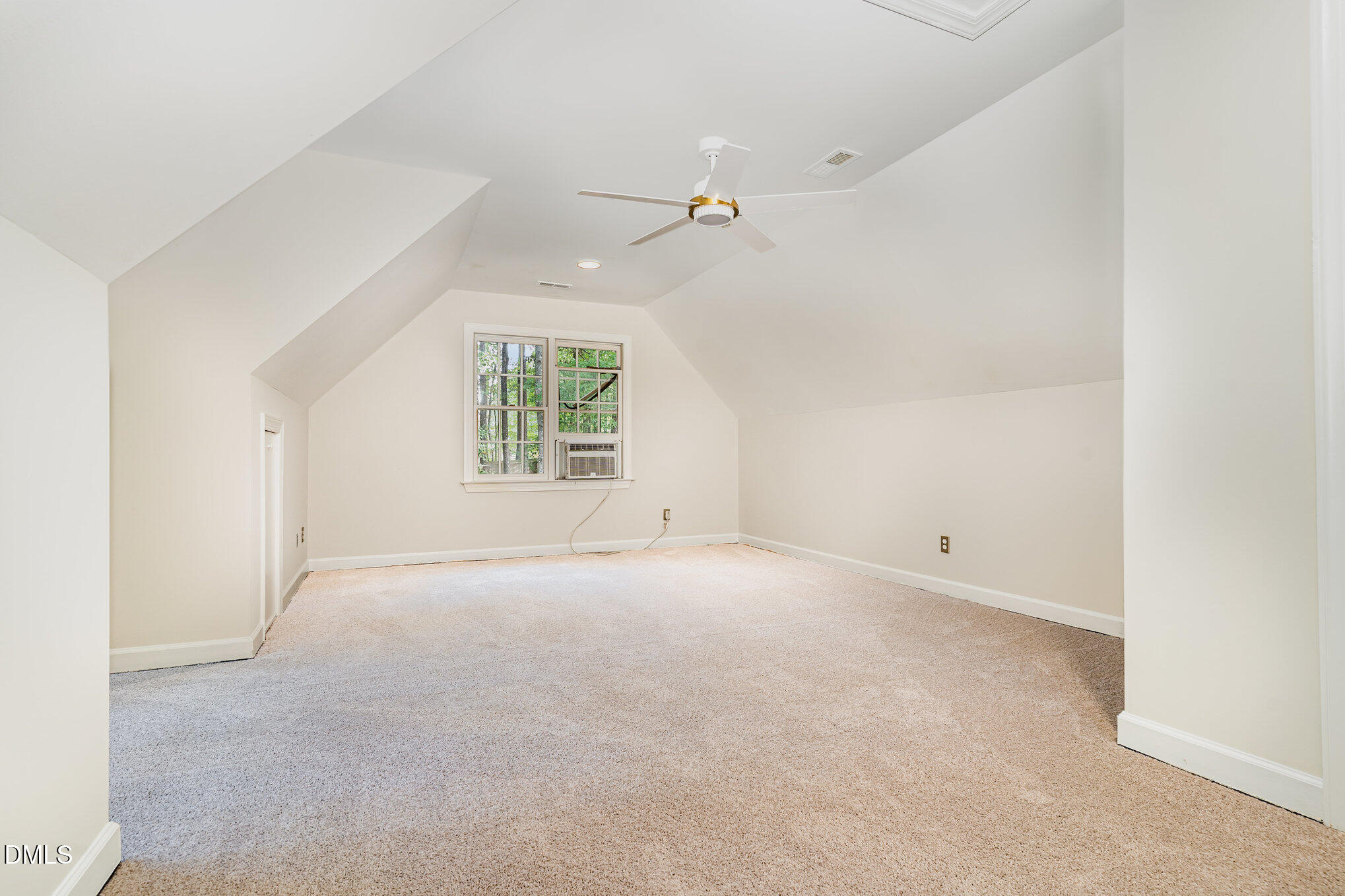 2425 Welsh Tavern Way Wake Forest, NC 27587 - Photo 14 of 34 an empty room with windows and ceiling fan