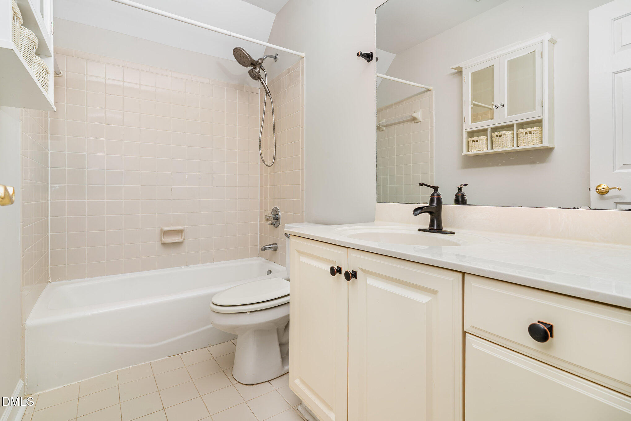 2425 Welsh Tavern Way Wake Forest, NC 27587 - Photo 23 of 34 a bathroom with a sink a toilet and a bathtub