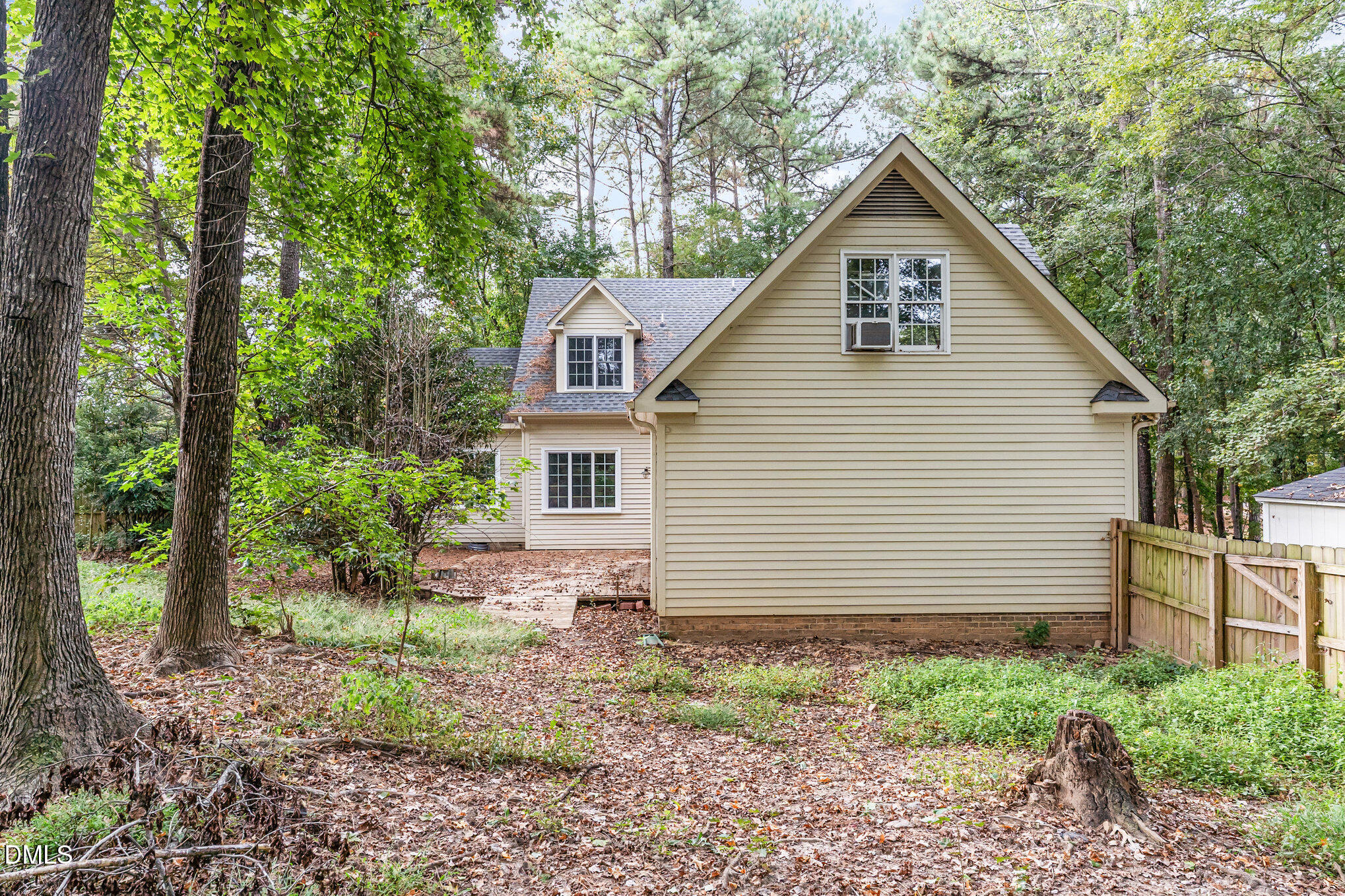 2425 Welsh Tavern Way Wake Forest, NC 27587 - Photo 28 of 34 a view of a house with a yard