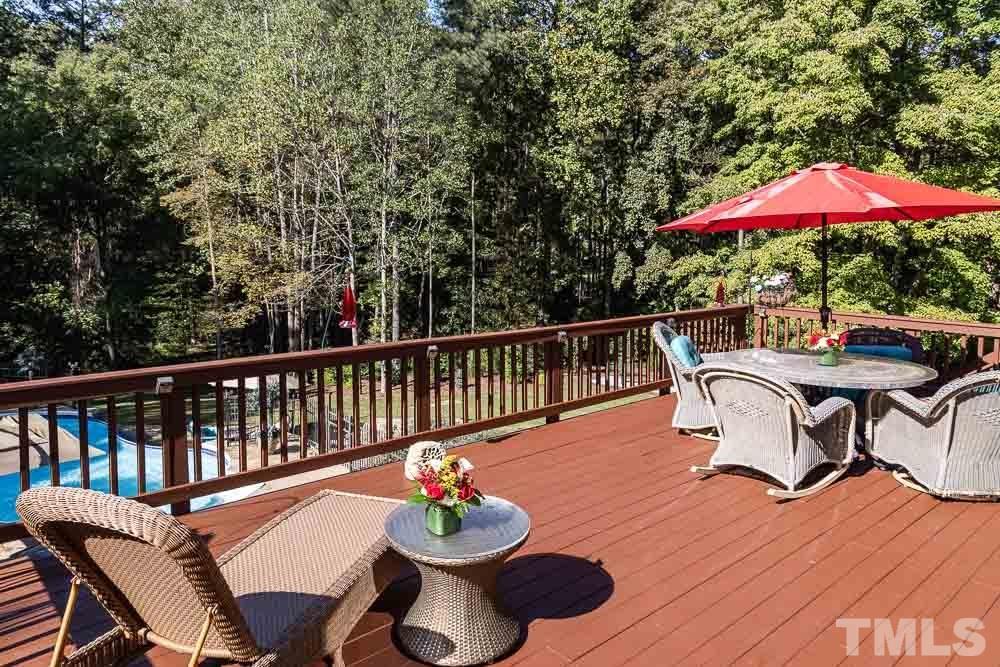 11437 John Allen Road Raleigh, NC 27614 - Photo 46 of 50 a view of a table and chairs in patio