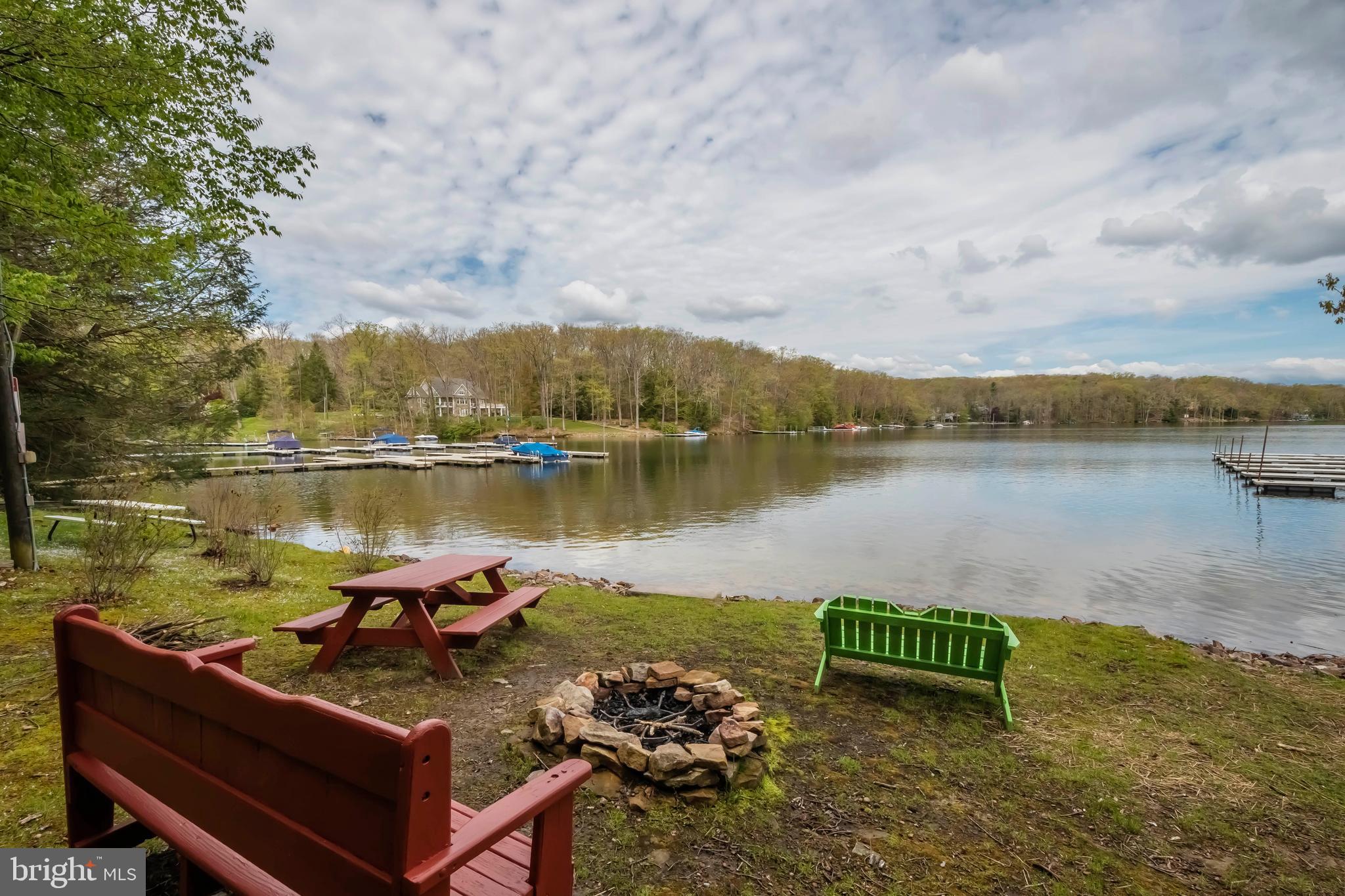 189 Red Run Road, Unit 1C2 Oakland, MD 21550 - Photo 30 of 50 a view of a lake with a terrace