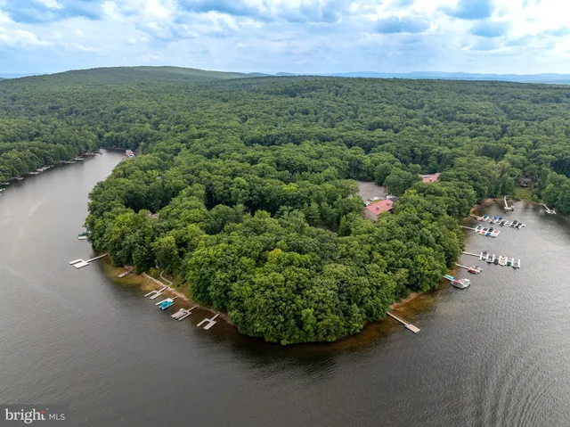 an aerial view of a houses with outdoor space and street view