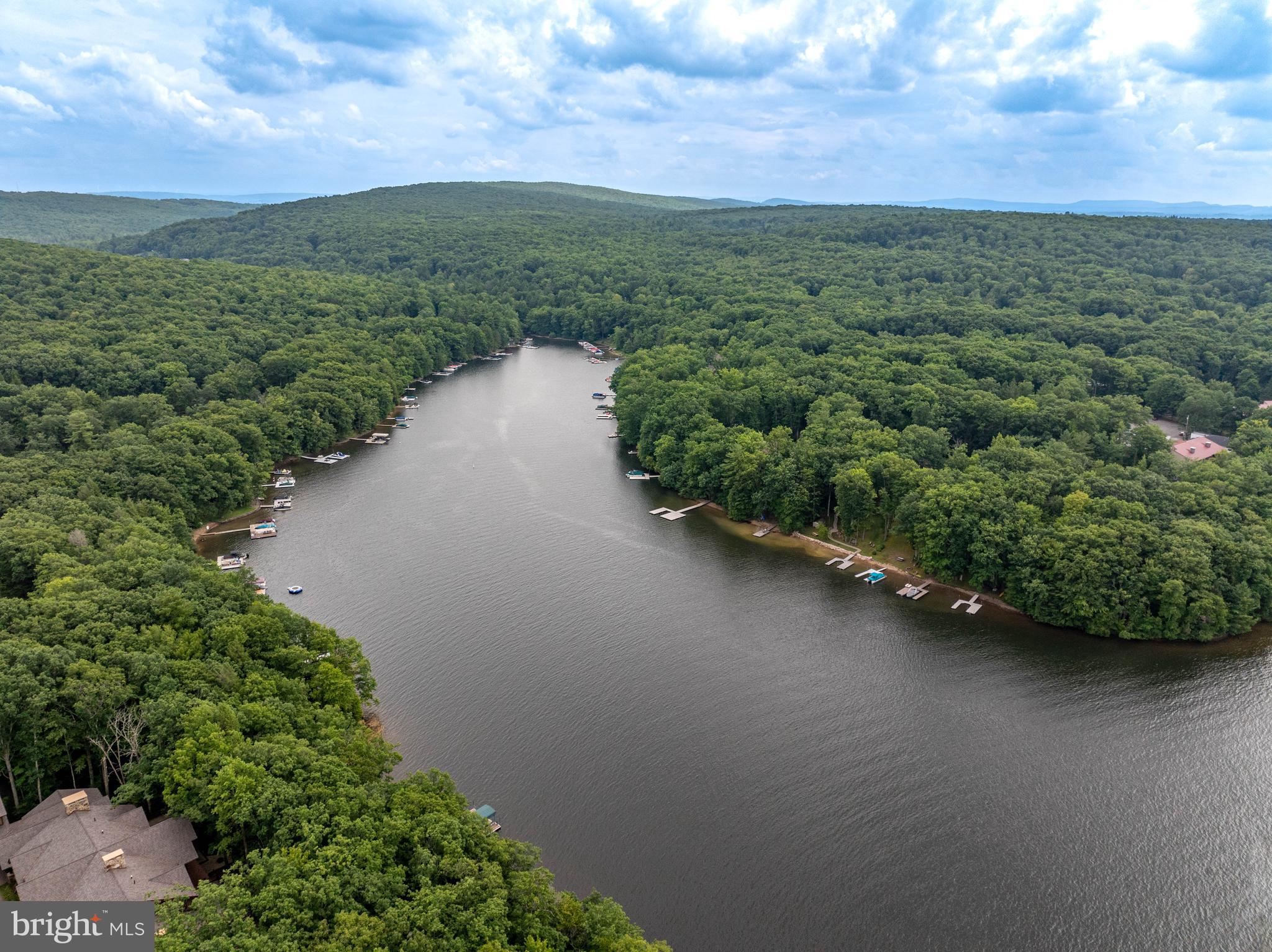 189 Red Run Road, Unit 1C2 Oakland, MD 21550 - Photo 46 of 50 a view of a lake with a outdoor space