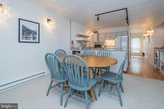 a view of a dining room with furniture