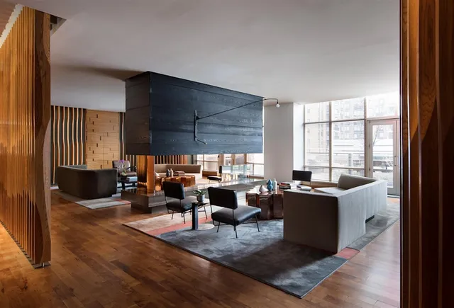 a room with furniture and a flat screen tv