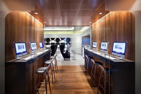 a room with lots of potted plants