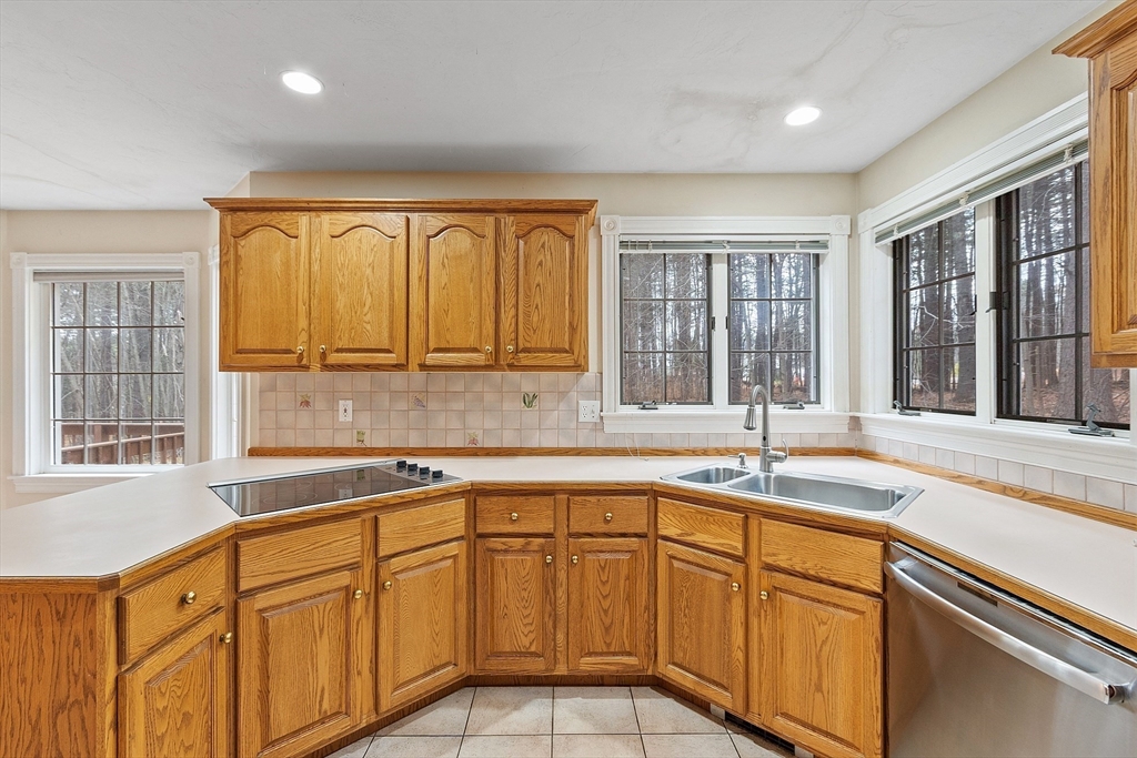 96 Cedarwood Road Boxborough, MA 01719 - Photo 20 of 41 a kitchen that has a sink and a window