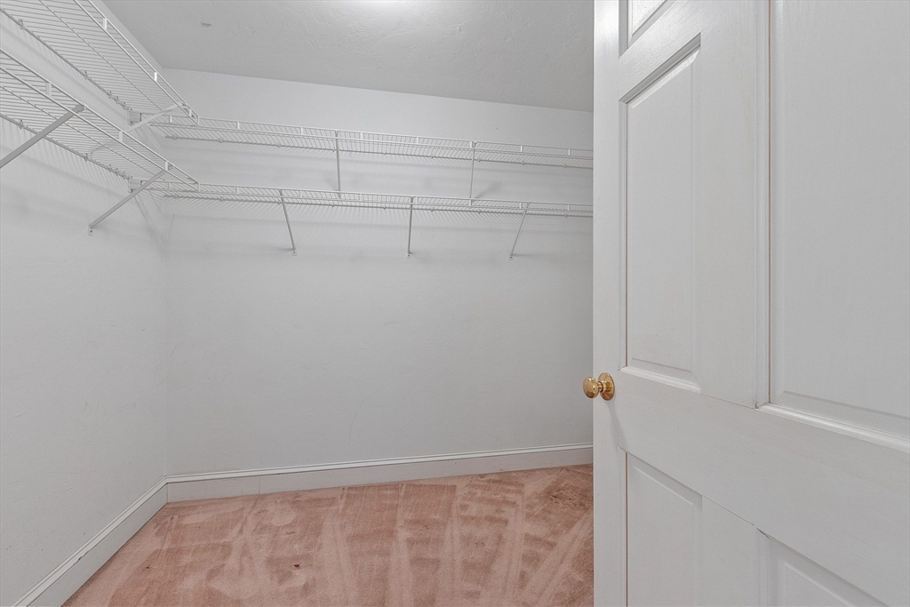 96 Cedarwood Road Boxborough, MA 01719 - Photo 26 of 41 a view of a rack on the wall