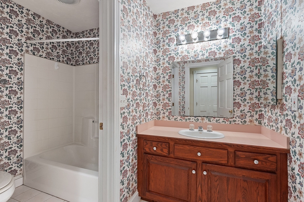96 Cedarwood Road Boxborough, MA 01719 - Photo 33 of 41 a bathroom with a sink and a bathtub