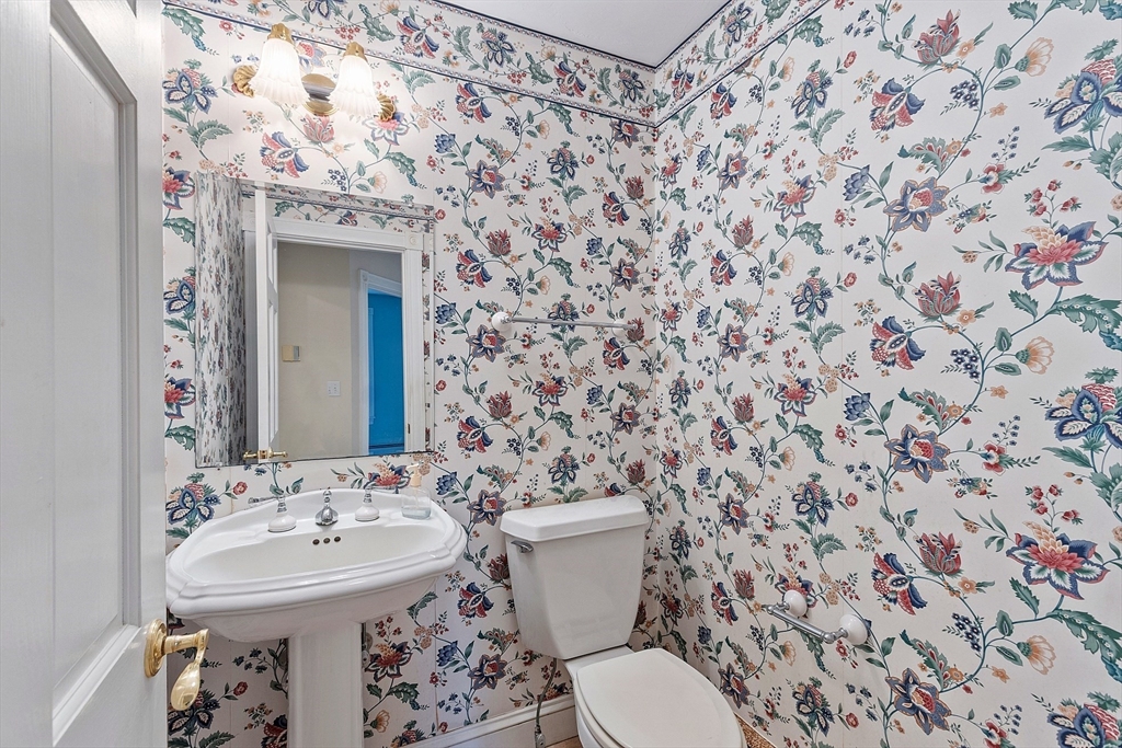 96 Cedarwood Road Boxborough, MA 01719 - Photo 34 of 41 a bathroom with a sink and mirror with toilet