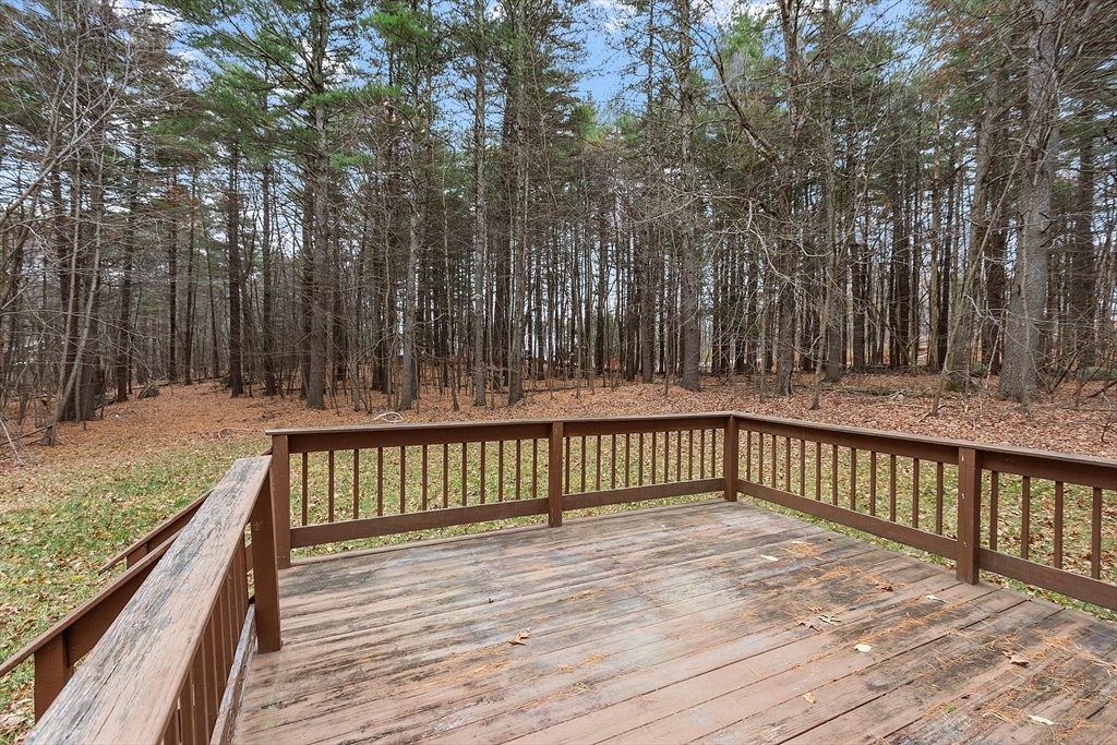 96 Cedarwood Road Boxborough, MA 01719 - Photo 39 of 41 a balcony with wooden floor and fence