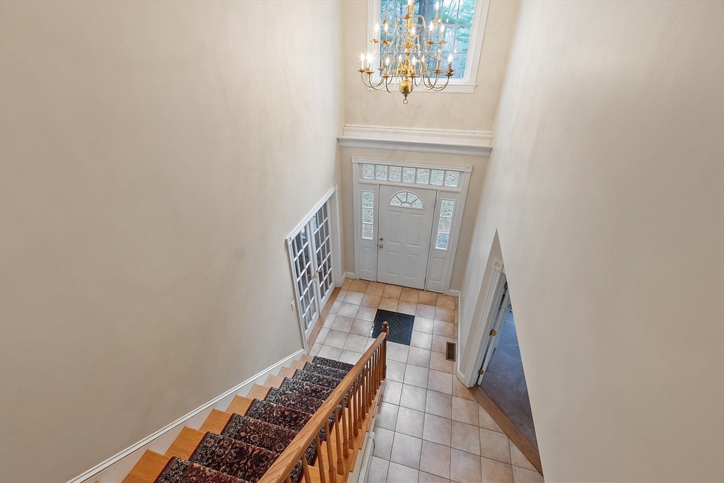 96 Cedarwood Road Boxborough, MA 01719 - Photo 4 of 41 a view of an entryway with wooden floor