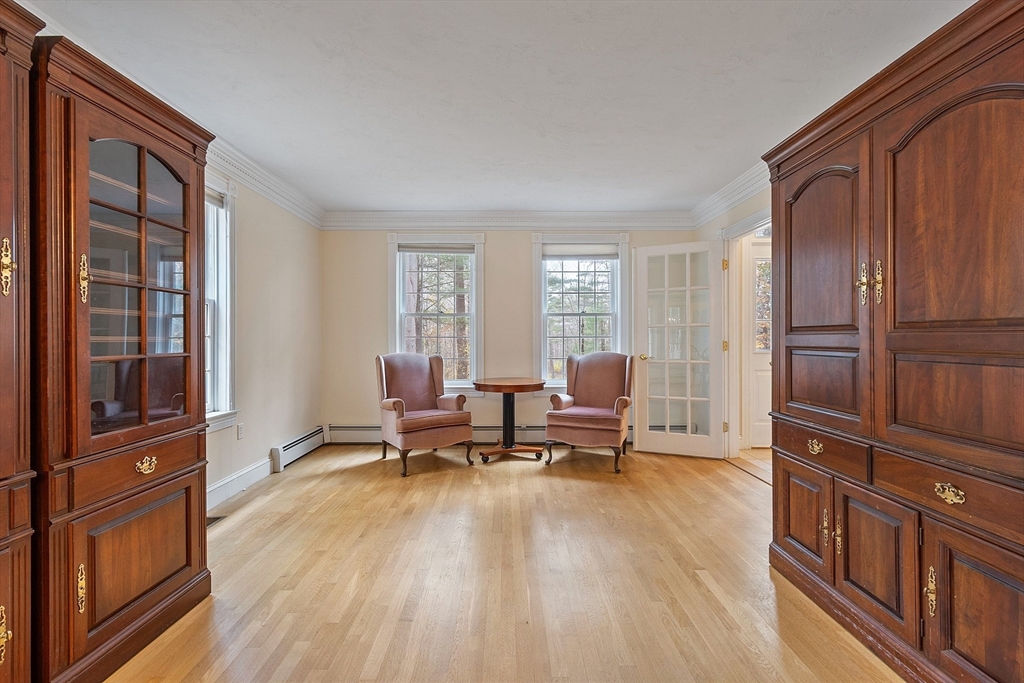 96 Cedarwood Road Boxborough, MA 01719 - Photo 7 of 41 a living room with furniture a window and wooden floor
