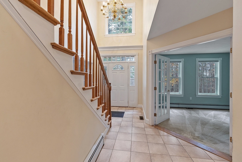 96 Cedarwood Road Boxborough, MA 01719 - Photo 10 of 41 a view of an entryway with staircase