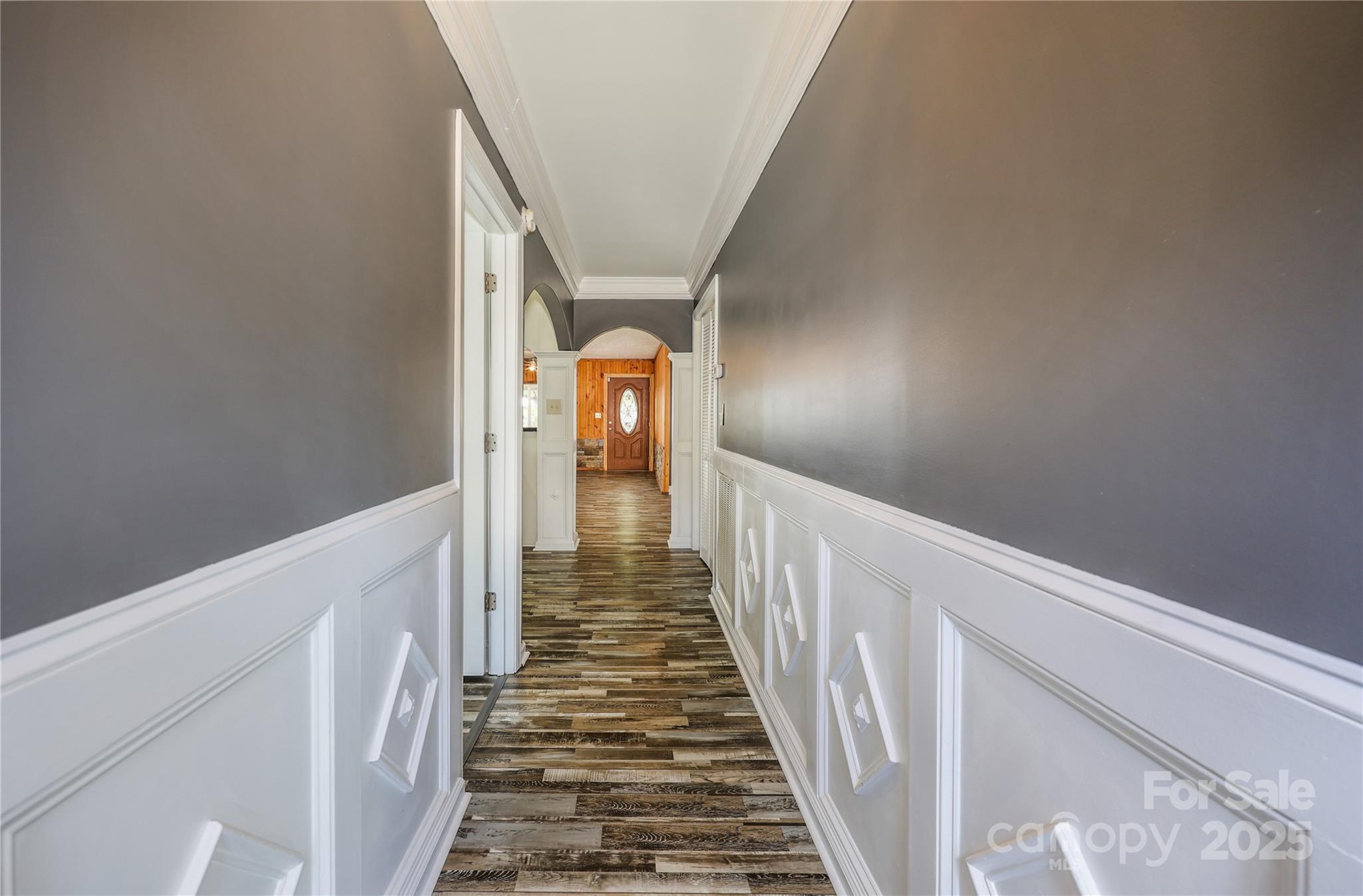 4651 Shiptontown Road, Unit 46 Denton, NC 27239 - Photo 26 of 48 a view of a hallway with wooden floor and staircase