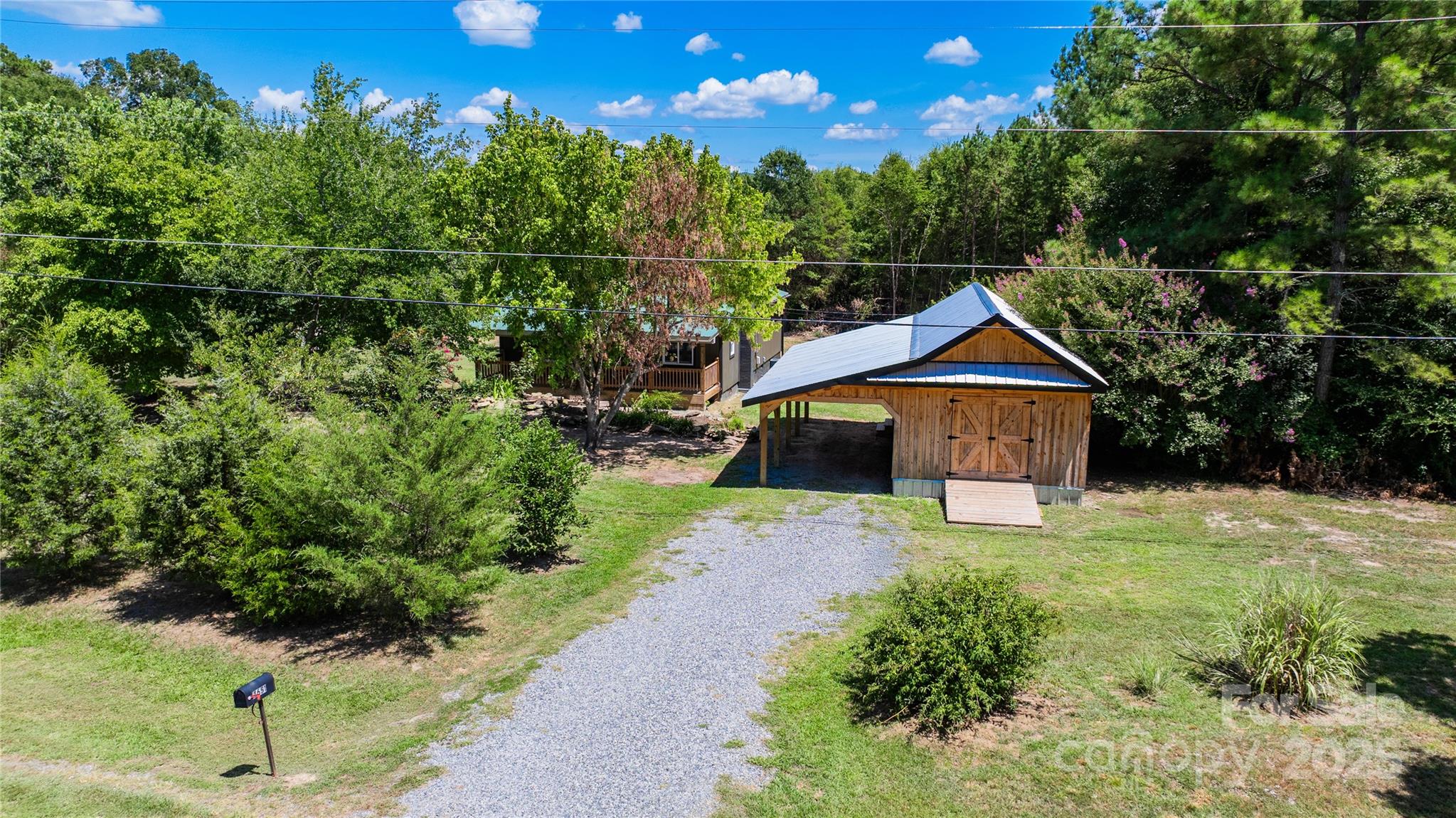 4651 Shiptontown Road, Unit 46 Denton, NC 27239 - Photo 28 of 48 a front view of a house with yard