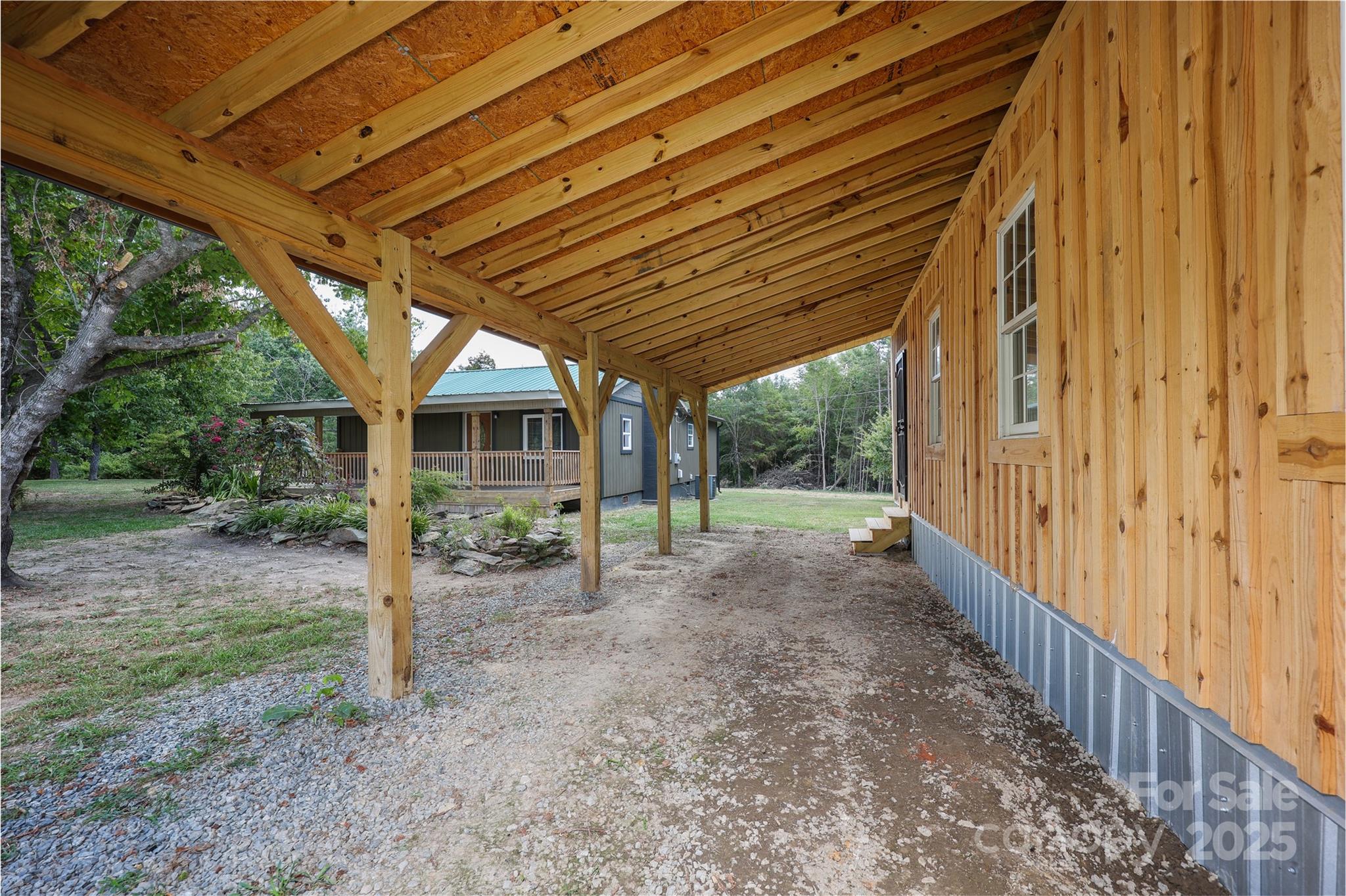 4651 Shiptontown Road, Unit 46 Denton, NC 27239 - Photo 34 of 48 a view of a backyard with garden