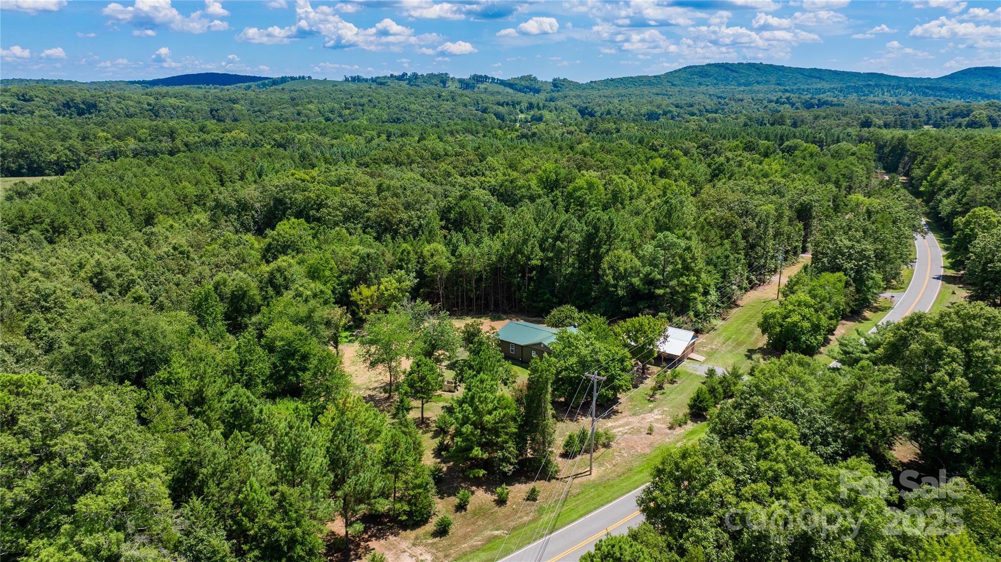 4651 Shiptontown Road, Unit 46 Denton, NC 27239 - Photo 41 of 48 an aerial view of a house with a yard