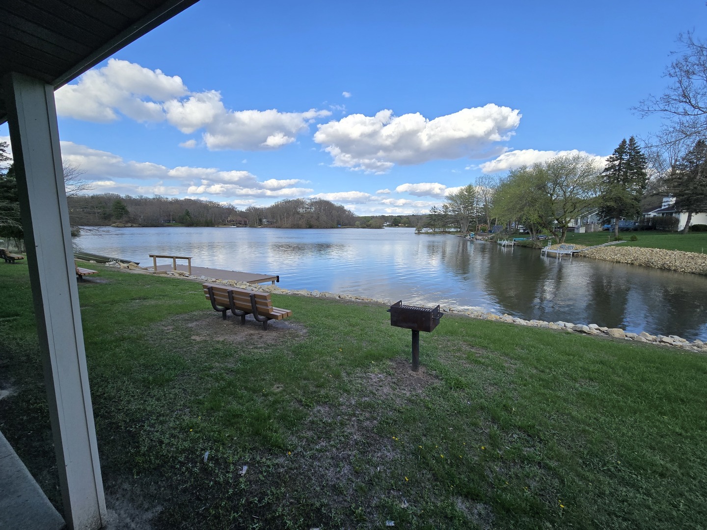 211 Maple Lane Dixon, IL 61021 - Photo 1 of 5 a view of a lake with a yard