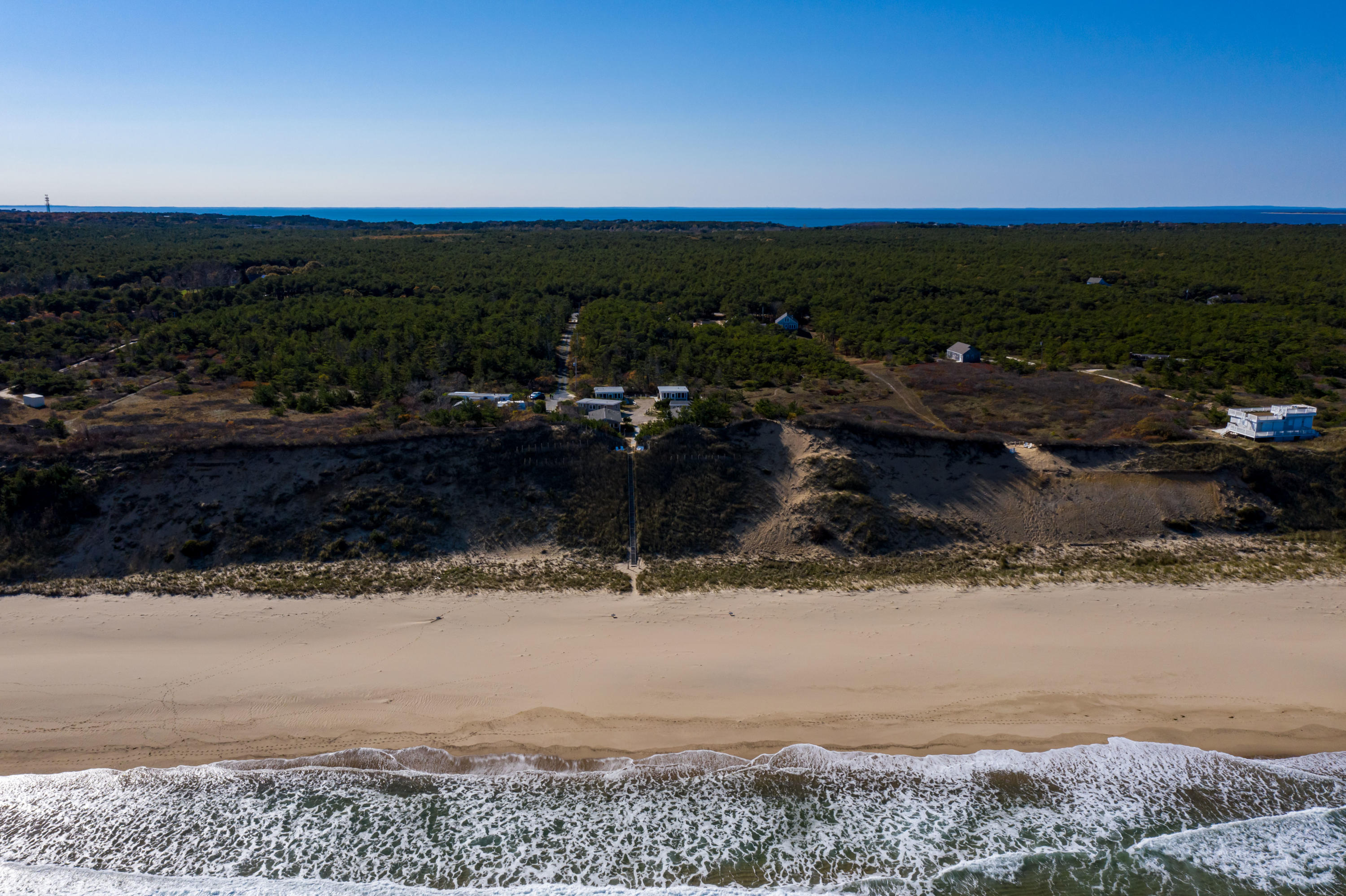 17 Coast Guard Road Truro, MA 02666 - Photo 5 of 19 a view of a yard with wooden floor