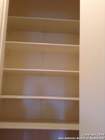 7231 Raintree Forest San Antonio, TX 78233 - Photo 18 of 20 a close view of cupboard