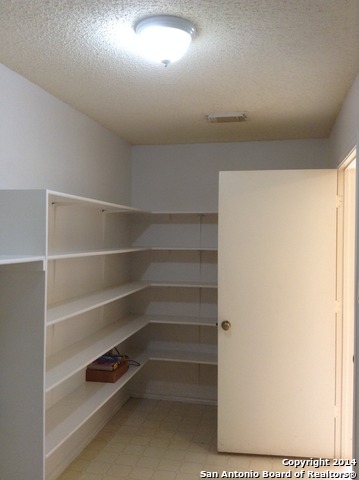 7231 Raintree Forest San Antonio, TX 78233 - Photo 19 of 20 a view of room with empty racks