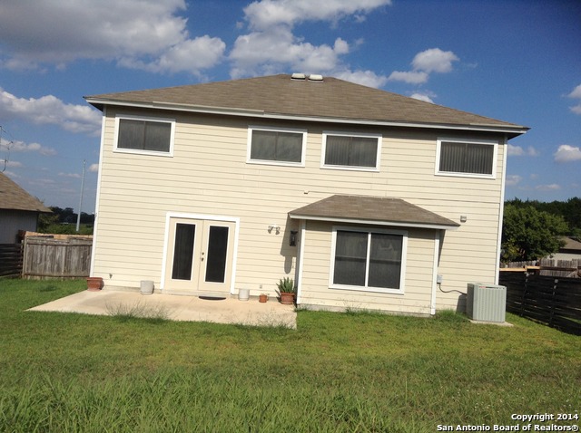 7231 Raintree Forest San Antonio, TX 78233 - Photo 2 of 20 a house that has a big yard in front of it