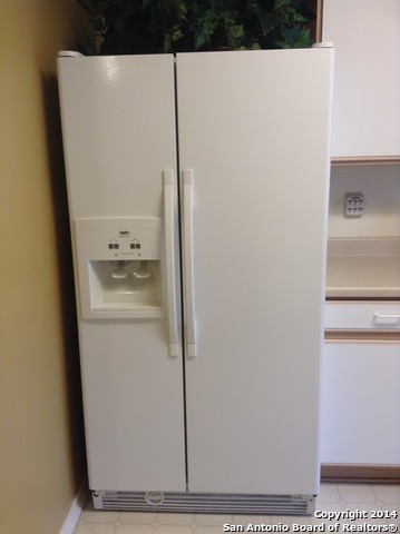 7231 Raintree Forest San Antonio, TX 78233 - Photo 5 of 20 a utility room with dryer and washer