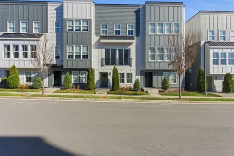 a view of street with large building