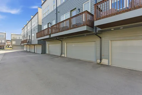 a view of a house with a parking space