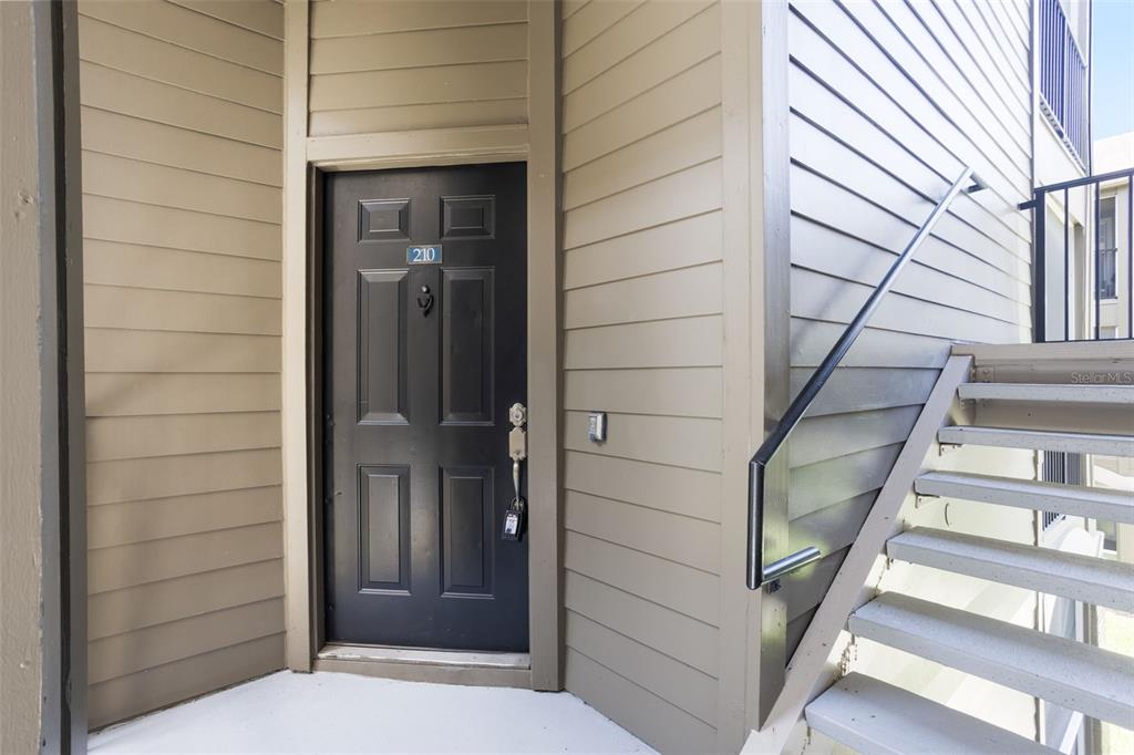 408 Summit Ridge Place, Unit 210 Longwood, FL 32779 - Photo 1 of 32 a view of front door of the house