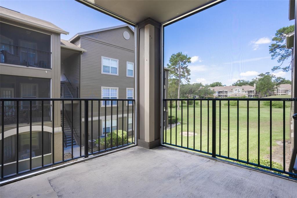 408 Summit Ridge Place, Unit 210 Longwood, FL 32779 - Photo 2 of 32 a view of a balcony