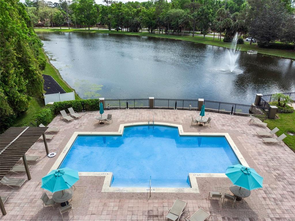 408 Summit Ridge Place, Unit 210 Longwood, FL 32779 - Photo 21 of 32 an aerial view of a house with a lake view