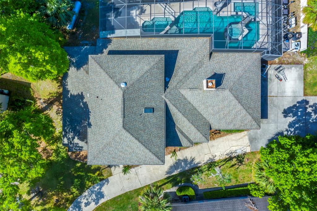 408 Summit Ridge Place, Unit 210 Longwood, FL 32779 - Photo 32 of 32 an aerial view of a house with a yard and garden