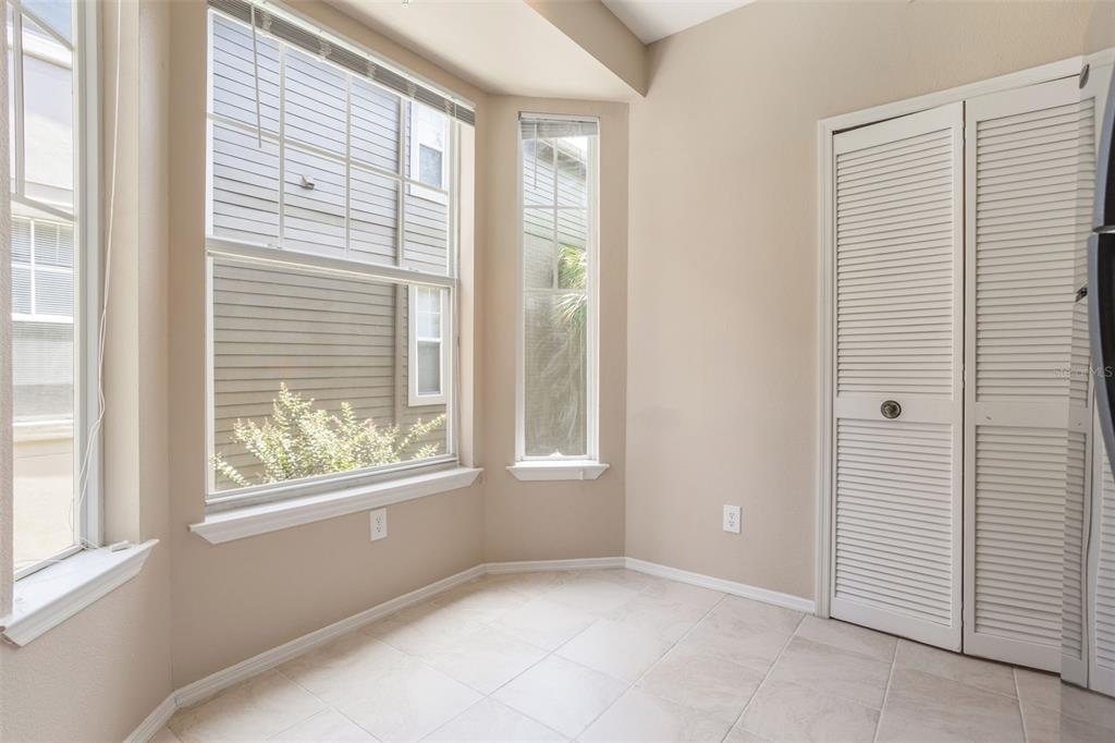 408 Summit Ridge Place, Unit 210 Longwood, FL 32779 - Photo 10 of 32 a view of an empty room with a window