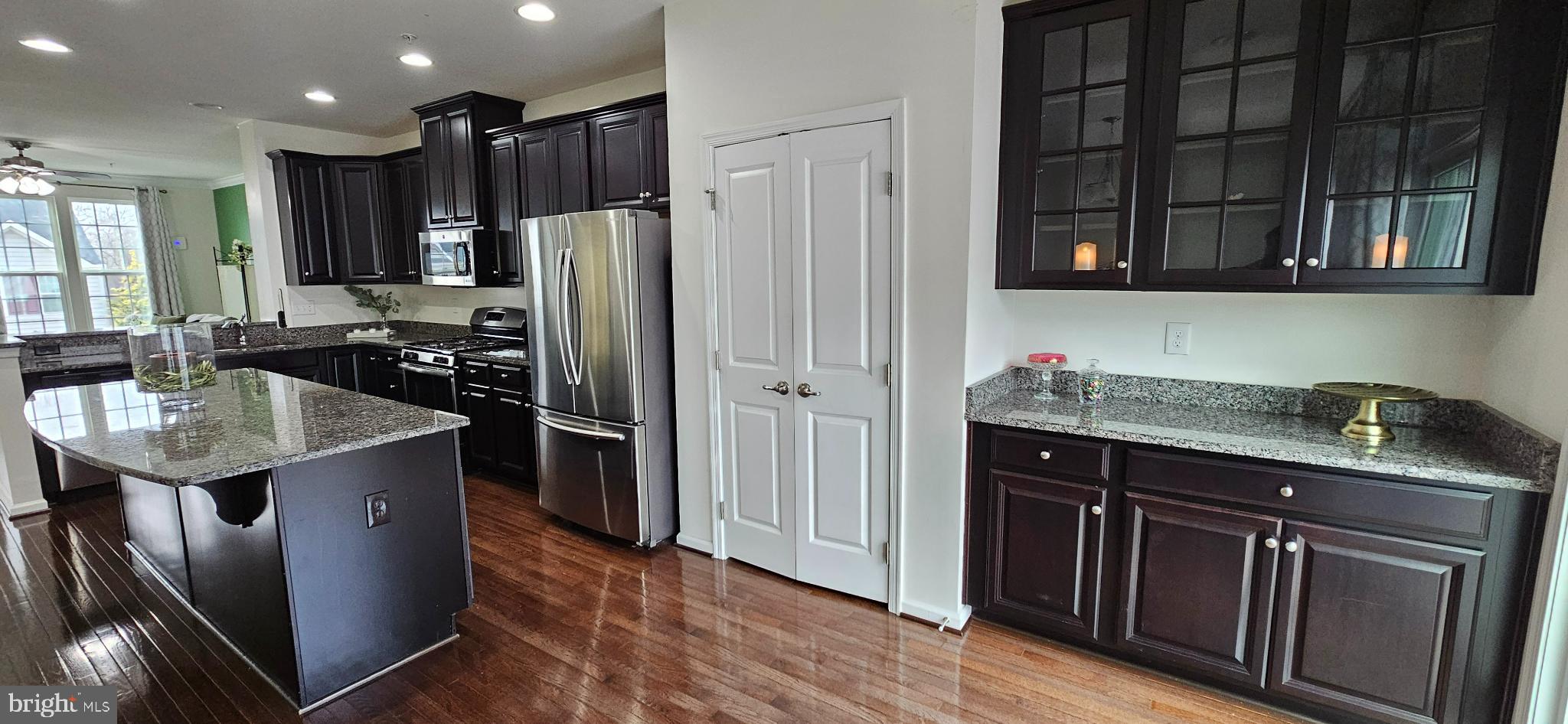 420 Lopata Road Phoenixville, PA 19460 - Photo 20 of 38 a kitchen with stainless steel appliances granite countertop a sink stove and refrigerator