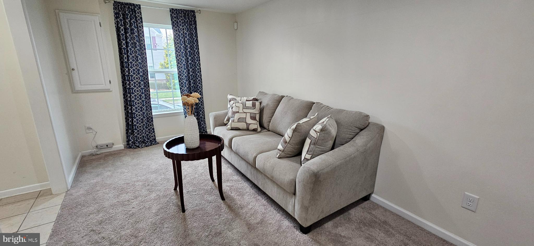 420 Lopata Road Phoenixville, PA 19460 - Photo 4 of 38 a living room with furniture and a window