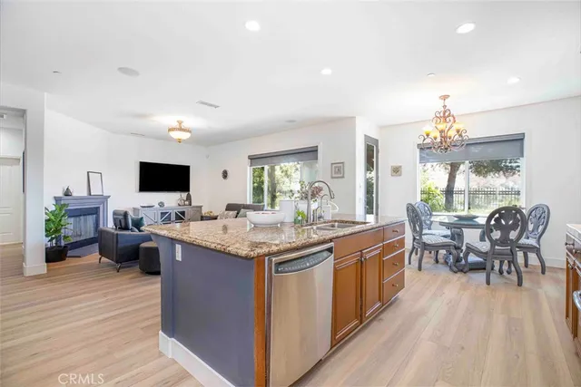 a spacious bedroom with a bed and a cabinets