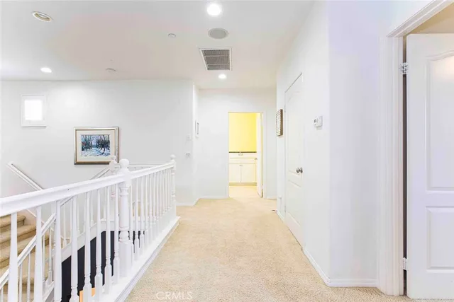 a bedroom with a workspace