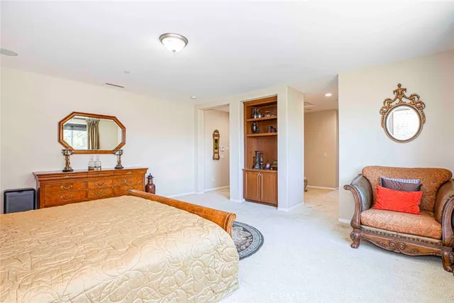 a view of a patio with a table chairs and a garden