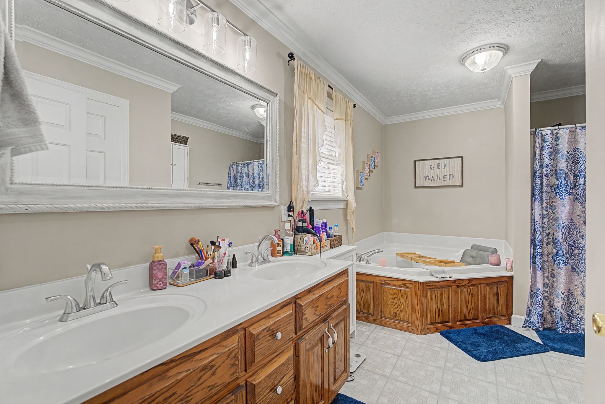 48 Fox Run Lane Carthage, TN 37030 - Photo 25 of 38 a bathroom with a sink vanity and a mirror
