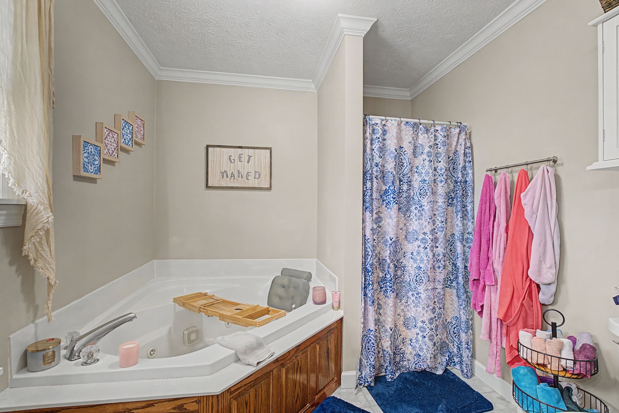 48 Fox Run Lane Carthage, TN 37030 - Photo 26 of 38 a bathroom with a tub sink and shower curtain