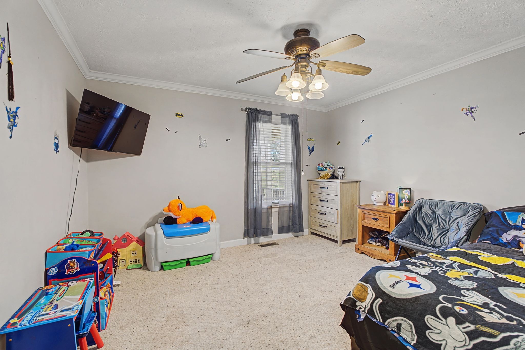 48 Fox Run Lane Carthage, TN 37030 - Photo 27 of 38 a bedroom with furniture and a flat screen tv