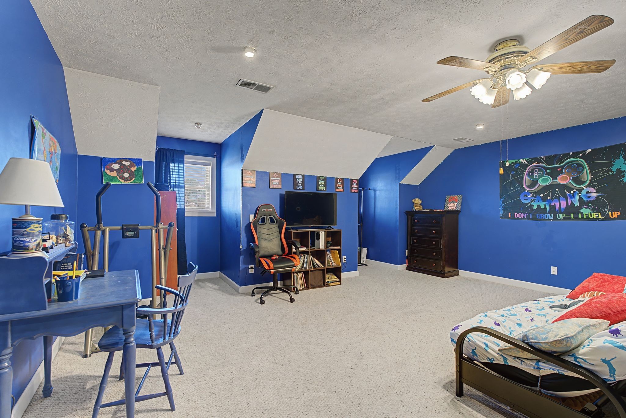 48 Fox Run Lane Carthage, TN 37030 - Photo 30 of 38 a bedroom with furniture and a chandelier