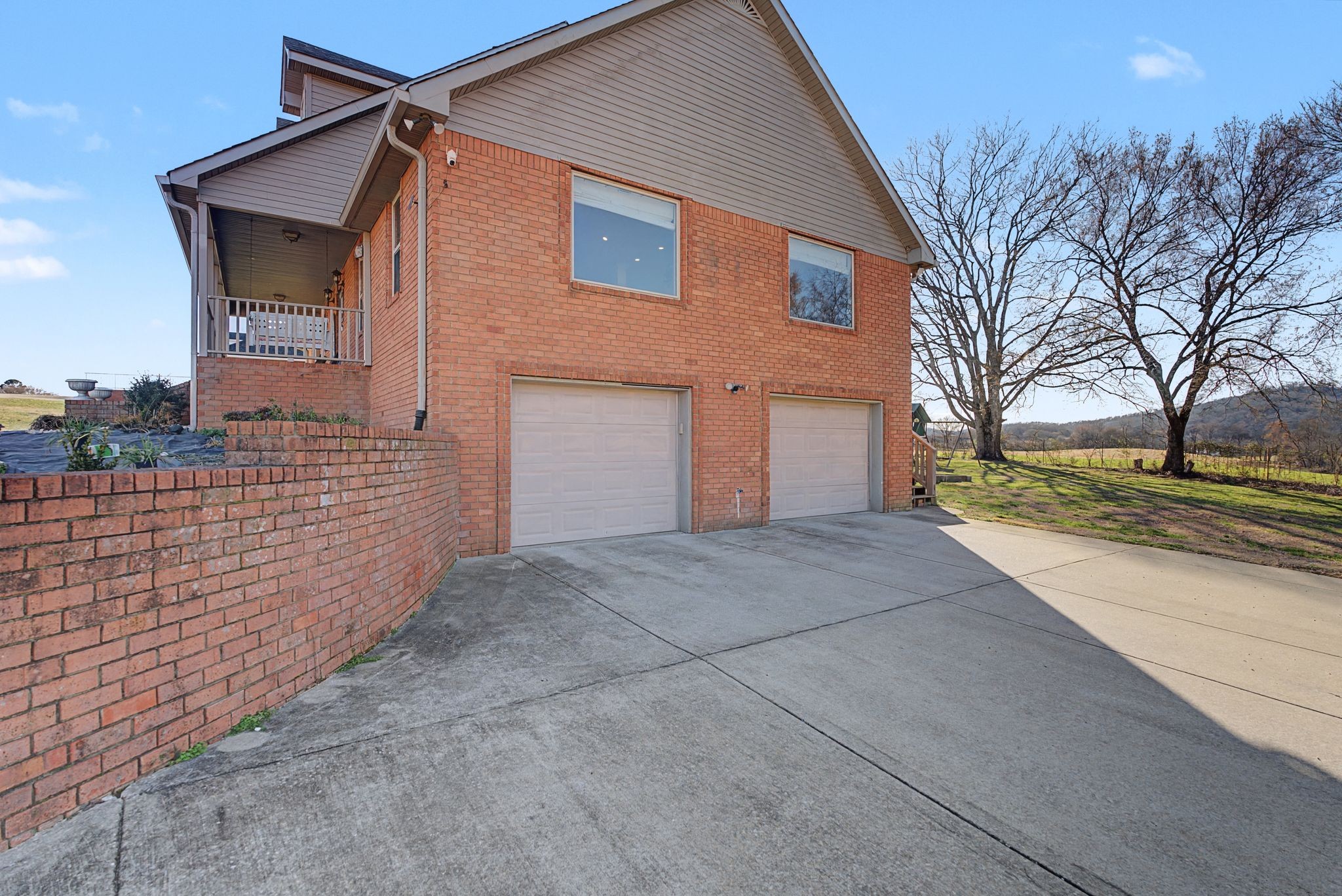 48 Fox Run Lane Carthage, TN 37030 - Photo 10 of 38 a view of a house with a yard and garage