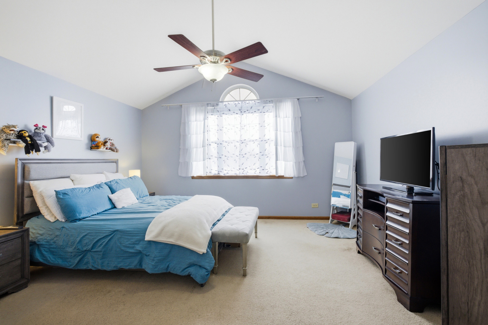 36106 North Springbrook Lane Gurnee, IL 60031 - Photo 17 of 27 a bedroom with a bed and a flat screen tv