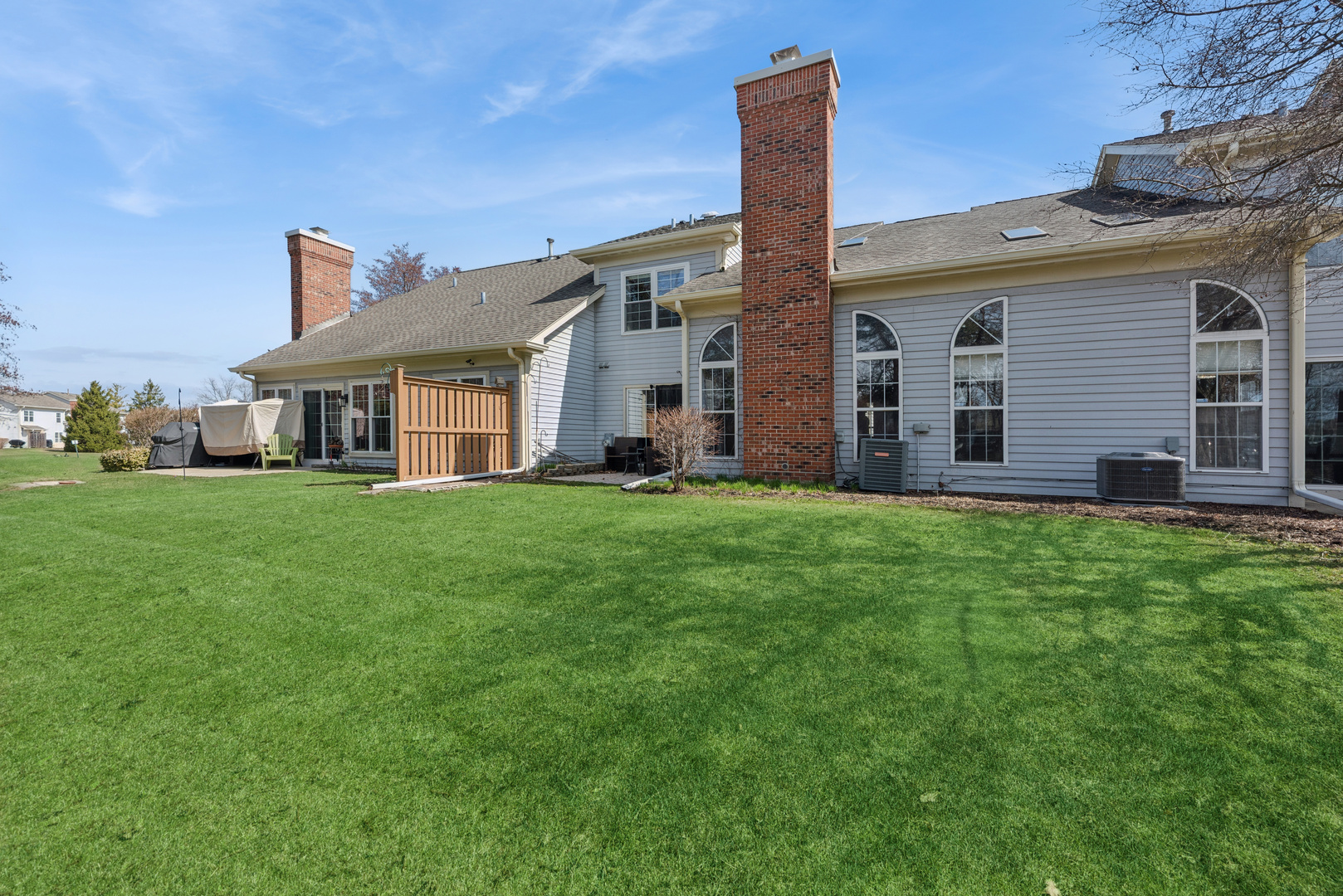 36106 North Springbrook Lane Gurnee, IL 60031 - Photo 4 of 27 a front view of house with yard and green space