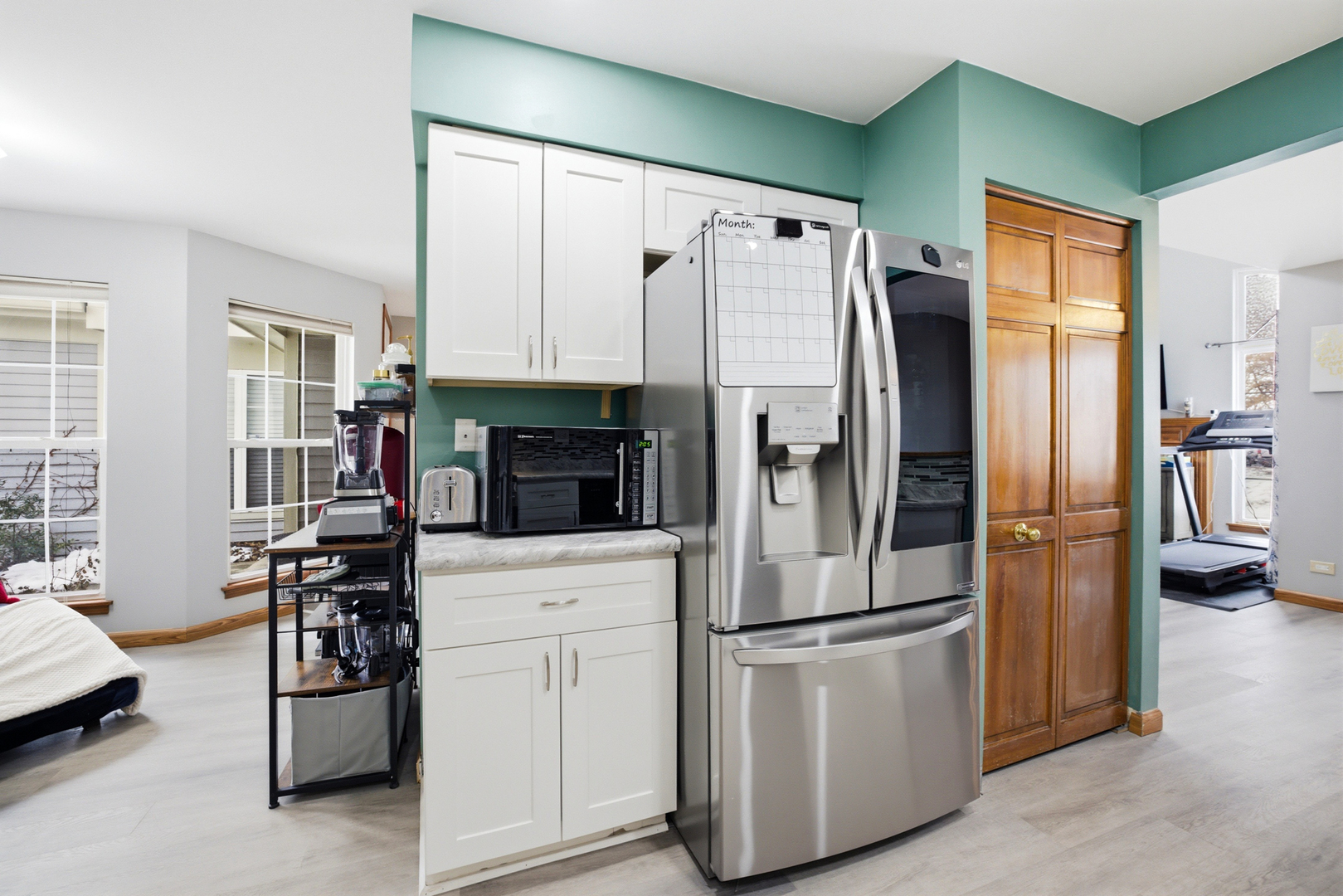36106 North Springbrook Lane Gurnee, IL 60031 - Photo 10 of 27 a kitchen with stainless steel appliances a refrigerator stove and microwave
