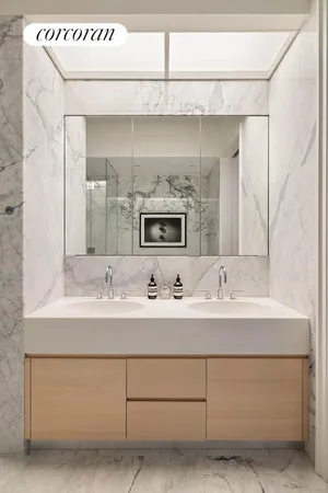 a bathroom with a sink and mirror