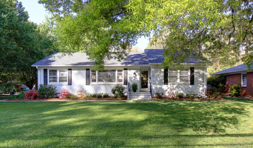4310 Walker Road Charlotte, NC 28211 - Photo 1 of 16 a front view of a house with garden and porch